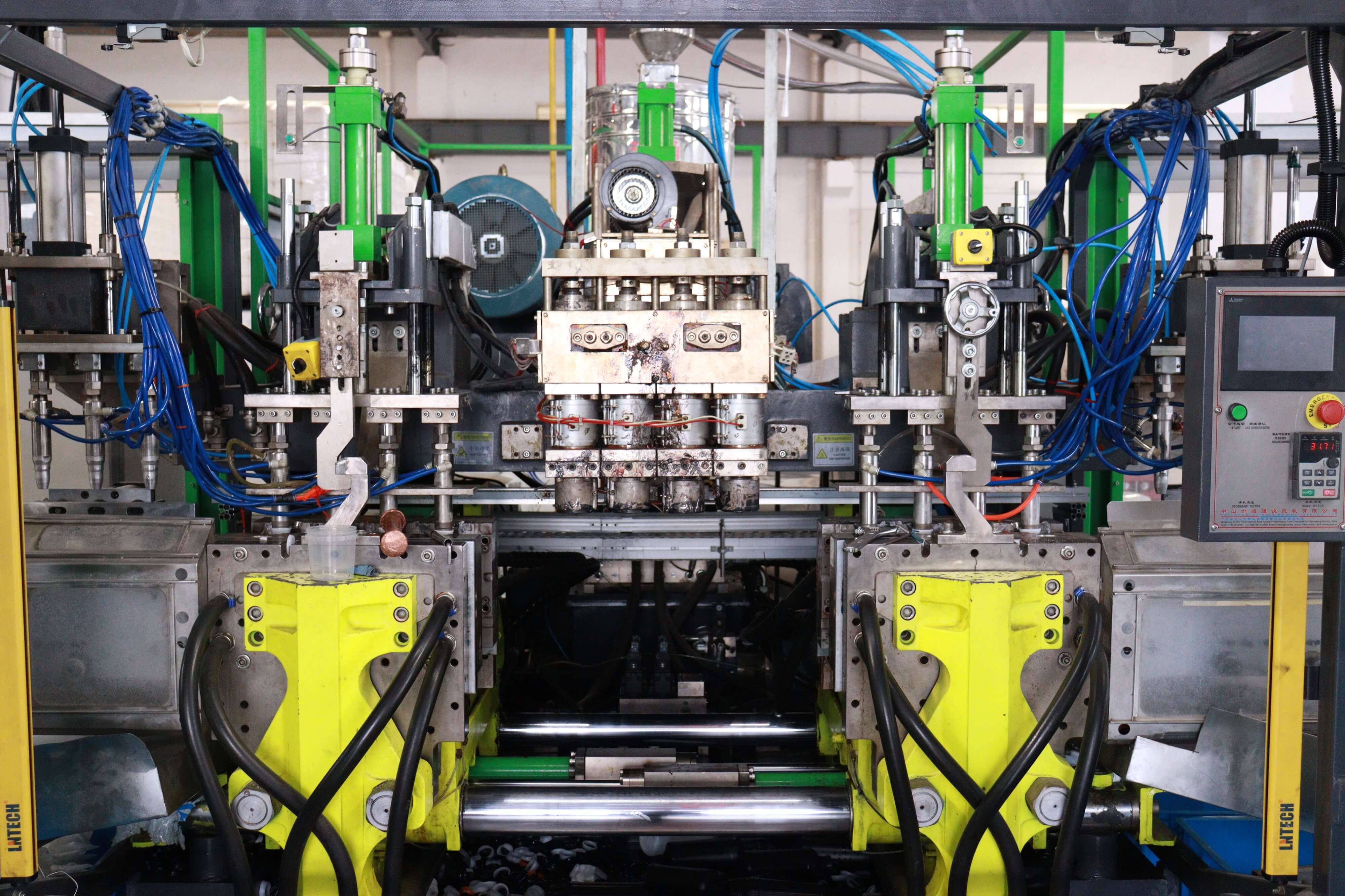 Système de moulage de soufflage d"extrusion à grande vitesse
